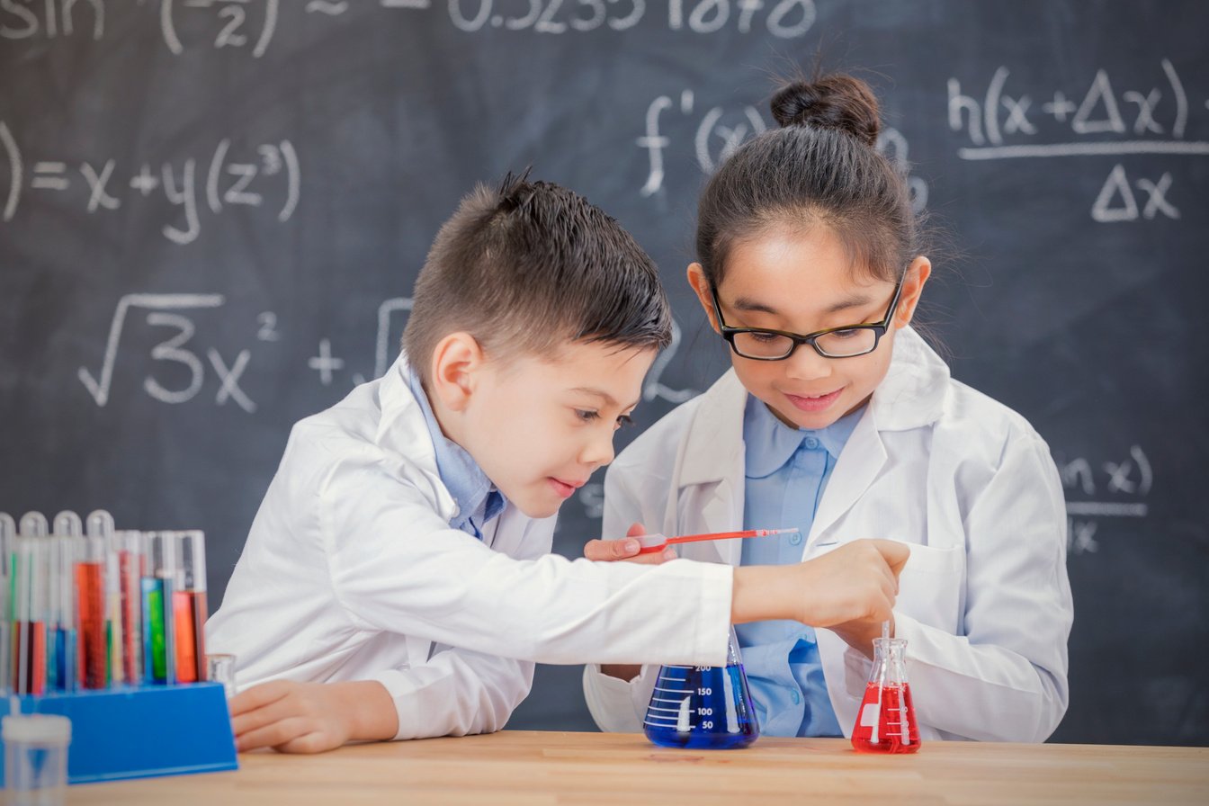 Smart STEM school kids in chemistry lab